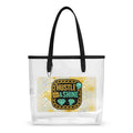 transparente Tragetasche mit schwarzem Griff und goldenem Hustle & Shine Design